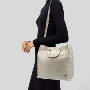 Prada authentic vintage lamb skin 
Taupe Vitello purse